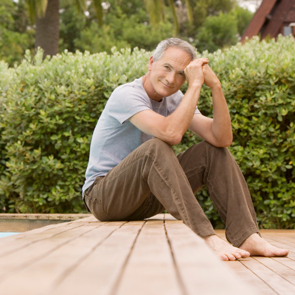 Man Sitting on Deck